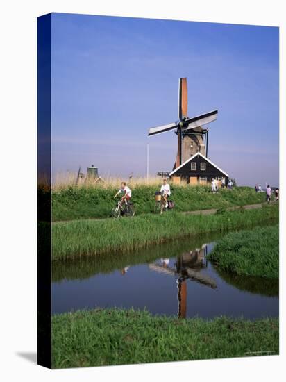 People Riding Bicycles, Zaanse Schans, Near Amsterdam, Holland-Roy Rainford-Stretched Canvas