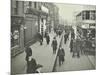 People Rushing to Get on a Trolley Bus at 7.05 Am, Tooting Broadway, London, April 1912-null-Mounted Photographic Print