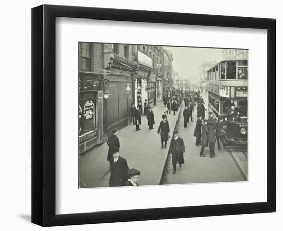 People Rushing to Get on a Trolley Bus at 7.05 Am, Tooting Broadway, London, April 1912-null-Framed Photographic Print