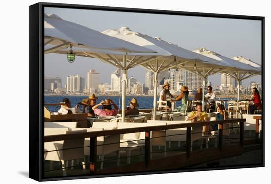 People Sitting at Casita Bar and Restaurant in Old Jaffa with a View over the Sea and Tel Aviv-Yadid Levy-Framed Stretched Canvas