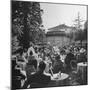 People Sitting at Tables on Terrace of Baur-Au-Lac Hotel-null-Mounted Photographic Print