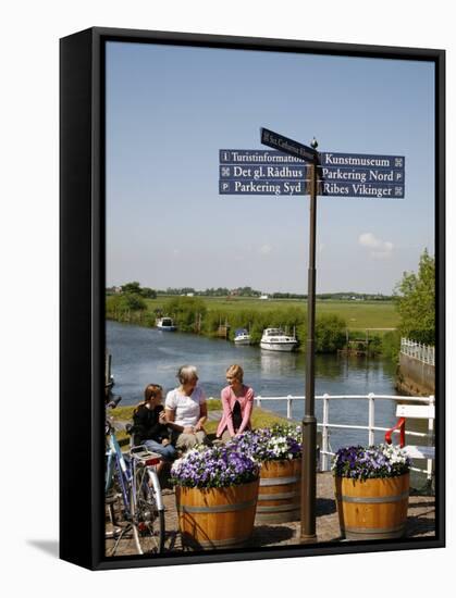 People Sitting on a Bench at Ribe City Center, Jutland, Denmark, Scandinavia, Europe-Yadid Levy-Framed Stretched Canvas