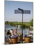 People Sitting on a Bench at Ribe City Center, Jutland, Denmark, Scandinavia, Europe-Yadid Levy-Mounted Photographic Print