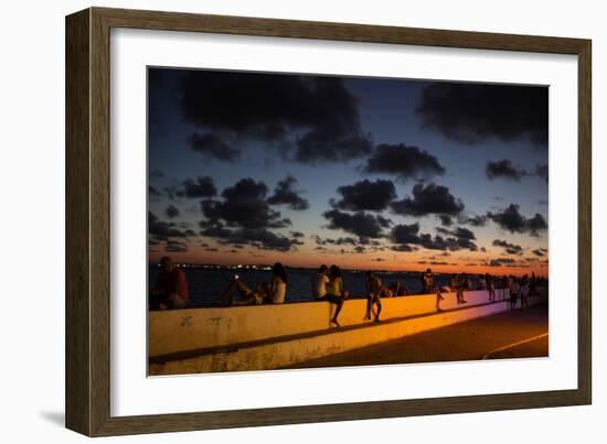 People Sitting on a Wall in Salvador at Dusk-Alex Saberi-Framed Photographic Print