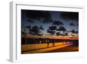 People Sitting on a Wall in Salvador at Dusk-Alex Saberi-Framed Photographic Print