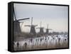 People Skate on Frozen Canals in Kinderdijk's Mill Area, a UNESCO World Heritage Site, Netherlands-null-Framed Stretched Canvas