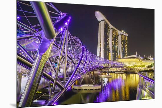 People Strolling on the Helix Bridge Towards the Marina Bay Sands and Artscience Museum at Night-Fraser Hall-Mounted Premium Photographic Print