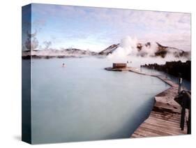 People Swim in the Blue Lagoon Spa in Grindavik, Iceland-null-Stretched Canvas