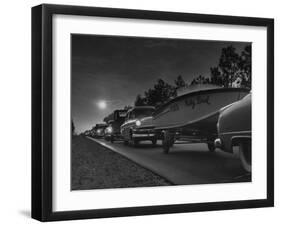 People Towing their Boats after Motor Boating Throughout the Day-null-Framed Photographic Print