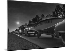 People Towing their Boats after Motor Boating Throughout the Day-null-Mounted Photographic Print