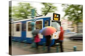 People Waiting for Streetcar on Damrak Street-Guido Cozzi-Stretched Canvas