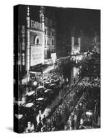 People Waiting in Front of the Brightly Lighted Empire Theatre for the Royal Film Performance-Cornell Capa-Stretched Canvas