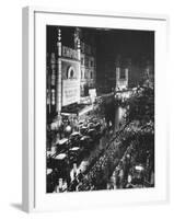 People Waiting in Front of the Brightly Lighted Empire Theatre for the Royal Film Performance-Cornell Capa-Framed Photographic Print