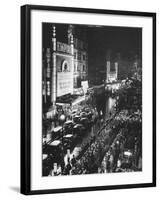 People Waiting in Front of the Brightly Lighted Empire Theatre for the Royal Film Performance-Cornell Capa-Framed Photographic Print