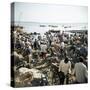 People Waiting on Beach for Dhows to Land Fish, Stone Town, Zanzibar, Tanzania, East Africa, Africa-Lee Frost-Stretched Canvas