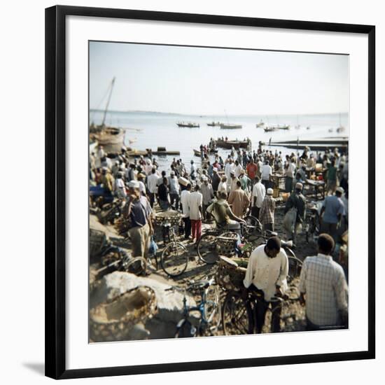 People Waiting on Beach for Dhows to Land Fish, Stone Town, Zanzibar, Tanzania, East Africa, Africa-Lee Frost-Framed Photographic Print