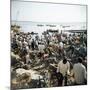 People Waiting on Beach for Dhows to Land Fish, Stone Town, Zanzibar, Tanzania, East Africa, Africa-Lee Frost-Mounted Photographic Print