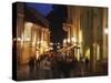 People Walking Along Pilies Gatve at Dusk, Vilnius, Lithuania, Baltic States, Europe-Ian Trower-Stretched Canvas