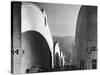 People Walking Between Sound Stages at Warner Brothers Studio-Margaret Bourke-White-Stretched Canvas