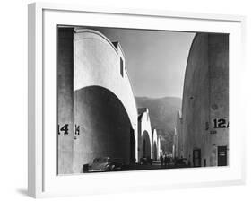 People Walking Between Sound Stages at Warner Brothers Studio-Margaret Bourke-White-Framed Photographic Print