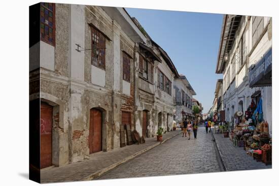 People walking on street, Calle Crisologo, Vigan, Ilocos Sur, Philippines-null-Stretched Canvas