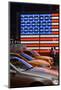 People Walking Past Neon Sign of American Flag on Times Square, New York, Manhattan, Usa-Christian Heeb-Mounted Photographic Print