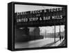 People Walking under Large Sign at Peech and Tozer Steel Plant-null-Framed Stretched Canvas