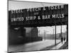 People Walking under Large Sign at Peech and Tozer Steel Plant-null-Mounted Photographic Print