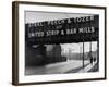 People Walking under Large Sign at Peech and Tozer Steel Plant-null-Framed Photographic Print