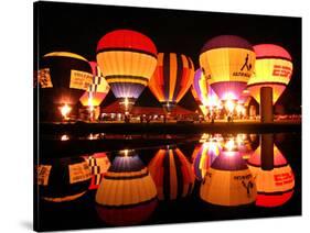 People Watch Hot Air Balloons as They Reflect off the Barigui Lake-null-Stretched Canvas