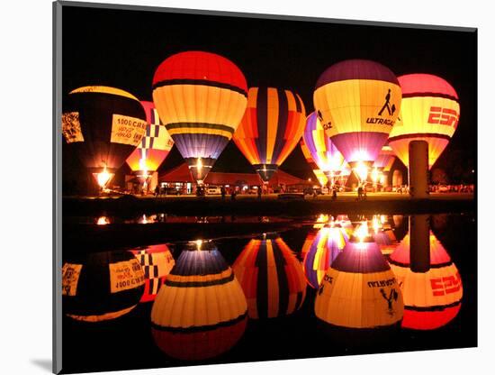 People Watch Hot Air Balloons as They Reflect off the Barigui Lake-null-Mounted Photographic Print