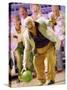 People Watching a Senior Man Bowling at a Bowling Alley-null-Stretched Canvas