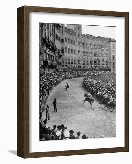 People Watching Horse Race that Is Traditional Part of the Palio Celebration-Walter Sanders-Framed Photographic Print