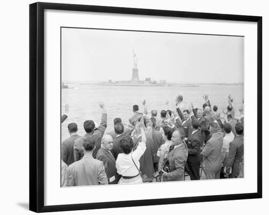 People Waving to the Statue of Liberty-null-Framed Photographic Print