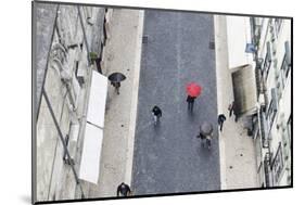 People with Colourful Umbrellas, Vertical View from the Elevador De Santa Justa, Lisbon-Axel Schmies-Mounted Photographic Print