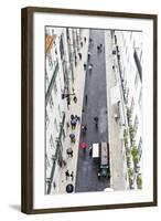 People with Colourful Umbrellas, Vertical View from the Elevador De Santa Justa, Lisbon-Axel Schmies-Framed Photographic Print