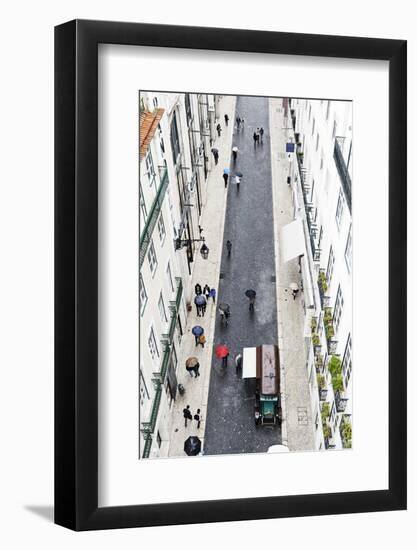 People with Colourful Umbrellas, Vertical View from the Elevador De Santa Justa, Lisbon-Axel Schmies-Framed Photographic Print