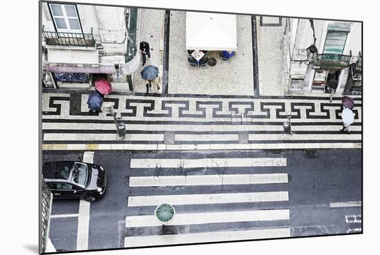 People with Colourful Umbrellas, Vertical View from the Elevador De Santa Justa on Street, Portugal-Axel Schmies-Mounted Photographic Print