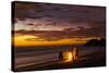 People with Driftwood Fire at Sunset on Playa Guiones Beach-Rob Francis-Stretched Canvas