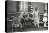 People with Three Dogs in a Garden, France-null-Stretched Canvas