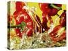 Peppers Falling into Water Against Yellow Background-Michael Meisen-Stretched Canvas