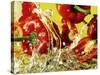 Peppers Falling into Water Against Yellow Background-Michael Meisen-Stretched Canvas