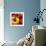 Peppers-null-Framed Art Print displayed on a wall