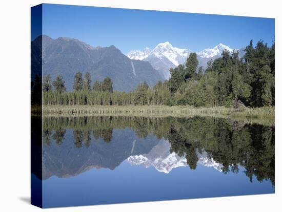 Perfect Reflection on Lake Matheson, Fox Glacier, Westland, South Island, New Zealand-D H Webster-Stretched Canvas