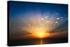 Perfect Sunrise on the Sea, with Radiant Rays of Sun over a Warm Colourful Horizont.-Roberto Caucino-Stretched Canvas