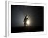 Performer is Silhouetted at the Opening Ceremonies for the XXI Olympic Winter Games in Vancouver-null-Framed Premium Photographic Print