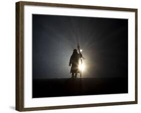 Performer is Silhouetted at the Opening Ceremonies for the XXI Olympic Winter Games in Vancouver-null-Framed Photographic Print