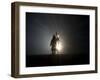 Performer is Silhouetted at the Opening Ceremonies for the XXI Olympic Winter Games in Vancouver-null-Framed Photographic Print