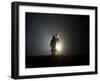 Performer is Silhouetted at the Opening Ceremonies for the XXI Olympic Winter Games in Vancouver-null-Framed Photographic Print