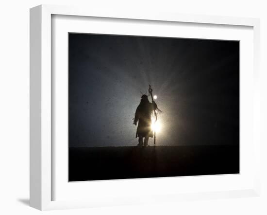 Performer is Silhouetted at the Opening Ceremonies for the XXI Olympic Winter Games in Vancouver-null-Framed Photographic Print